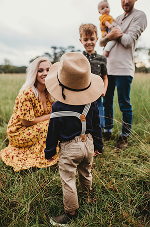 A licensed PolicyAdvisor advisor helping a family choose Manulife life insurance